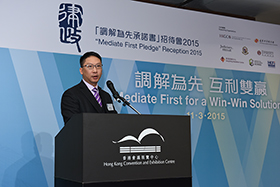 The Secretary for Justice, Mr Rimsky Yuen, SC delivers the Welcome Remarks at the “Mediate First” Pledge Reception on 11 March 2015.