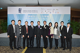 The Secretary for Justice, Mr Rimsky Yuen, SC with representatives from companies and associations.