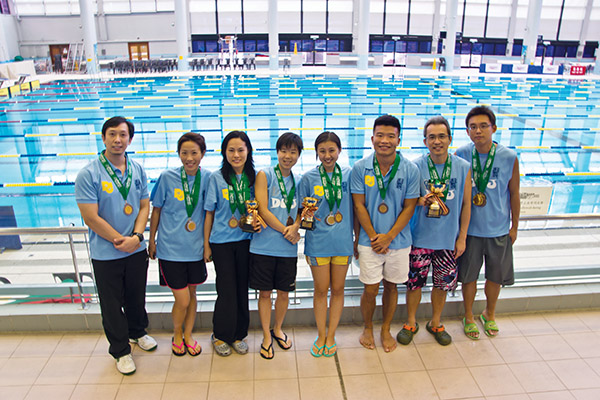 Staff taking part in swimming events of the Corporate Games in September 2012