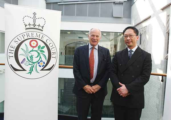 The Secretary for Justice (right) with the President of the Supreme Court, Lord Neuberger, during an official visit in London in September 2013