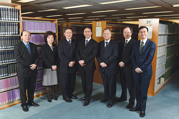 The Secretary for Justice, Mr Rimsky Yuen, SC (centre), with division heads (from left): Solicitor General, Mr Frank Poon; Law Officer (International Law), Ms Amelia Luk; Director of Administration and Development, Mr Cheuk Wing Hing; Law Officer (Civil Law), Mr Benedict Lai; Director of Public Prosecutions, Mr Keith Yeung, SC; and Law Draftsman, Mr Paul Wan