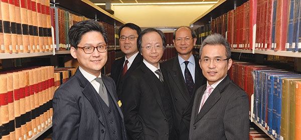 The Director of Public Prosecutions, Mr Keith Yeung, SC (centre), with Deputy Directors of Public Prosecutions (from left): Mr Wesley Wong, SC; Mr William Tam, SC; Dr Alain Sham; and Mr David Leung, SC