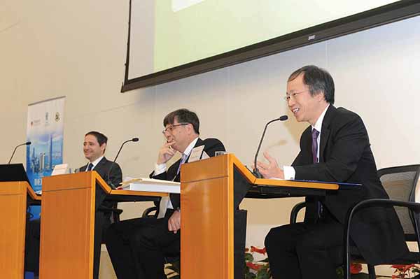 The Director of Public Prosecutions, Mr Keith Yeung, SC (right), debates in the conference