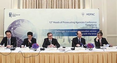 The then Director of Public Prosecutions, Mr Kevin Zervos, SC (centre), and deputy directors attending HOPAC 2013