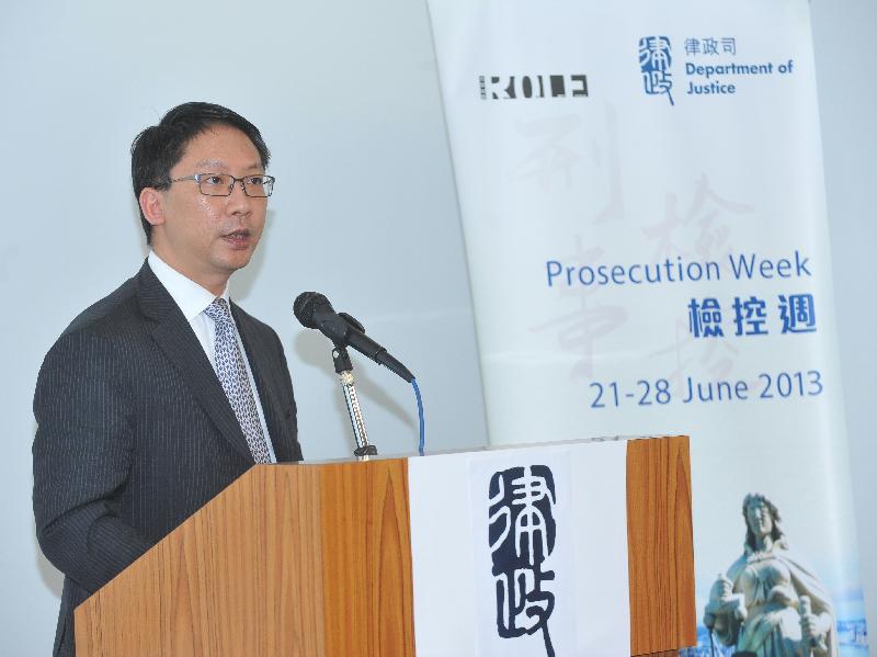 The Secretary for Justice, Mr Rimsky Yuen, SC, delivers a speech at the opening ceremony of Prosecution Week 2013 today (June 21).