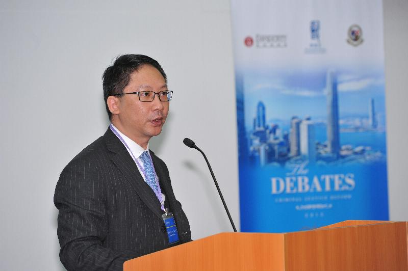 The Secretary for Justice, Mr Rimsky Yuen, SC, delivers a speech at "The Debates: Criminal Justice Reform" today (November 2).