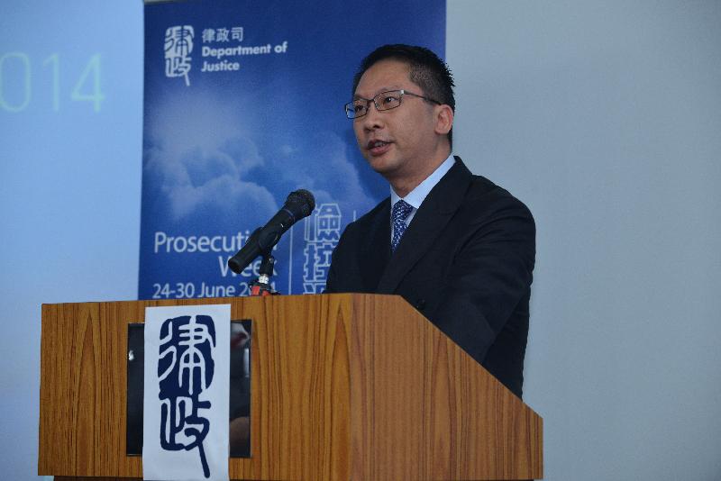 The Secretary for Justice, Mr Rimsky Yuen, SC, delivers a speech at the opening ceremony of Prosecution Week 2014 today (June 23).