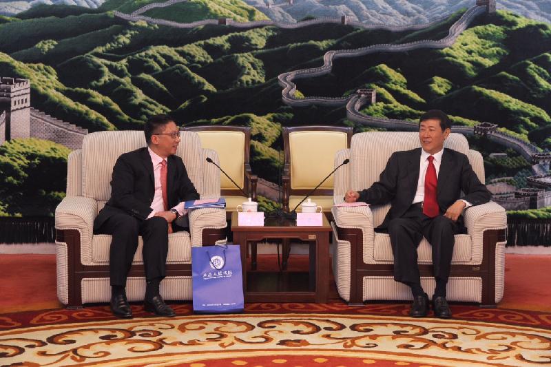 Mr Yuen (left) meets with the Vice-President of the Supreme People's Court, Mr Shen Deyong, in Beijing yesterday (August 17) to exchange views on judicial co-operation and mutual legal assistance matters between Hong Kong and the Mainland.