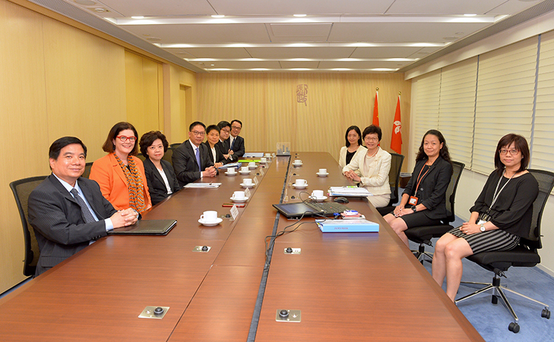 The Chief Secretary for Administration, Mrs Carrie Lam, visited the office building of the Department of Justice (DoJ) at Justice Place in Central this afternoon (August 4). Photo shows Mrs Lam (third right) meeting senior officials of the DoJ to learn more about the work of various divisions and the challenges they are facing. Attending the meeting were the Secretary for Justice, Mr Rimsky Yuen, SC (fourth left); the Law Officer (International Law), Ms Amelia Luk (third left); the Law Officer (Civil Law), Ms Christina Cheung (fifth left); the Law Draftsman, Ms Theresa Johnson (second left); the Solicitor General, Mr Wesley Wong, SC (sixth left); the Director of Administration and Development, Mr Alan Siu (first left); the Acting Director of Public Prosecutions, Mr William Tam, SC (seventh left); the Deputy Director (Special Duties), Mrs Apollonia Liu (second right); and the Departmental Secretary, Ms Phyllis Leung (first right).