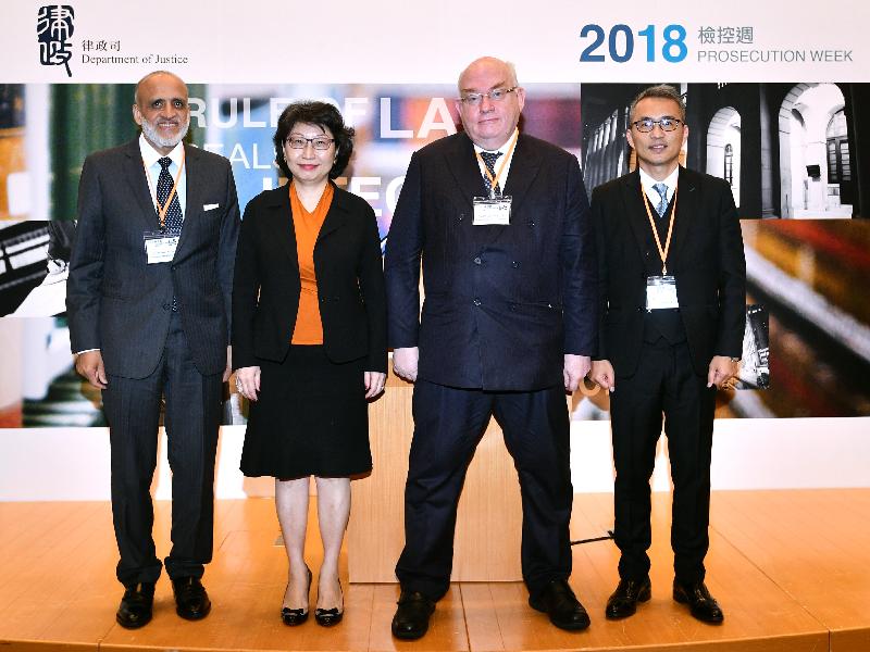 The Secretary for Justice, Ms Teresa Cheng, SC (second left), and the Director of Public Prosecutions, Mr David Leung, SC (first right), are pictured with the Chairman of the Hong Kong Bar Association, Mr Philip Dykes, SC (second right), and Vice President of the Law Society of Hong Kong, Mr Amirali Nasir (first left), at the opening ceremony of Prosecution Week 2018 today (June 22).