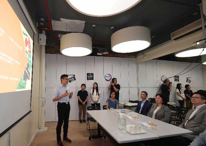 Accompanied by the Chairman of Kwai Tsing District Council, Mr Law King-shing (first right), and the District Officer (Kwai Tsing), Mr Kenneth Cheng (third right), the Secretary for Justice, Ms Teresa Cheng, SC (second right), visits the Youth Crime Prevention Centre run by the Hong Kong Federation of Youth Groups during her visit to Kwai Tsing District today (August 15).