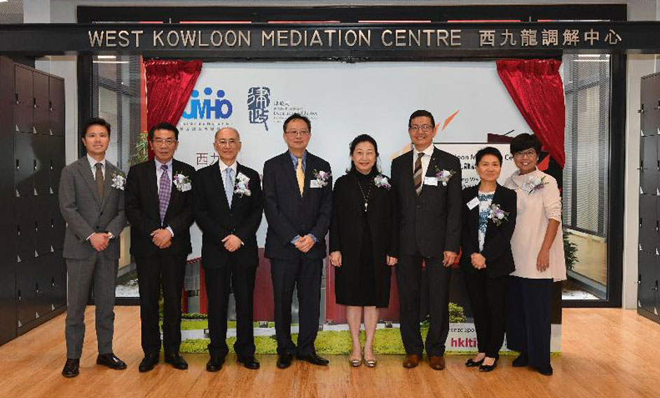 The Secretary for Justice, Ms Teresa Cheng, SC (fourth right), is pictured today (November 8) in a group photo with the Vice-President of the Court of Appeal of the High Court, Mr Justice Johnson Lam (fourth left); the Chairman of the Joint Mediation Helpline Office (JMHO), Mr Antony Man (third right); the Founding Chairman and advisor of the JMHO, Mr Chan Bing-woon (third left), and other guests at the opening ceremony of the West Kowloon Mediation Centre.