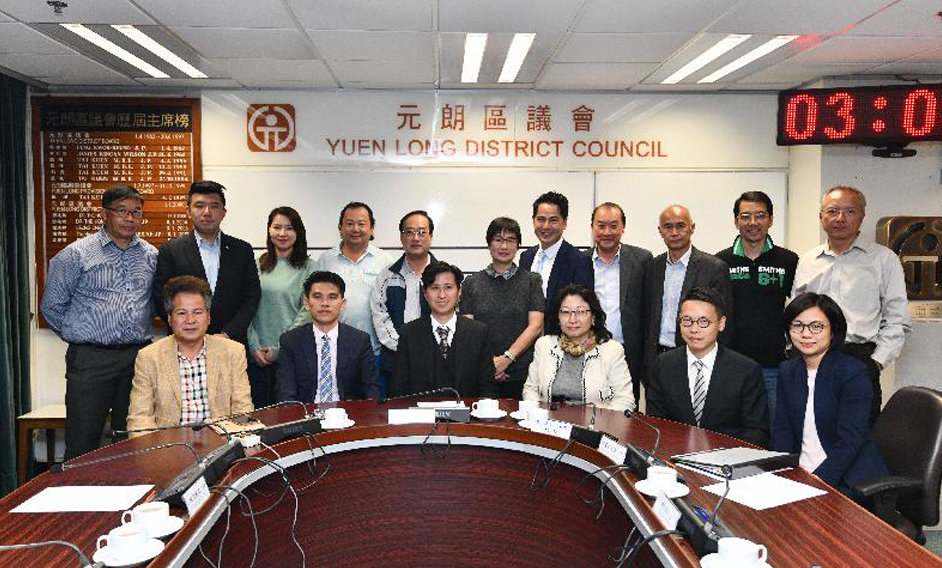 The Secretary for Justice, Ms Teresa Cheng, SC (front row, third right), visits Yuen Long District today (November 23) and meets with members of the Yuen Long District Council to exchange views on issues of concern.