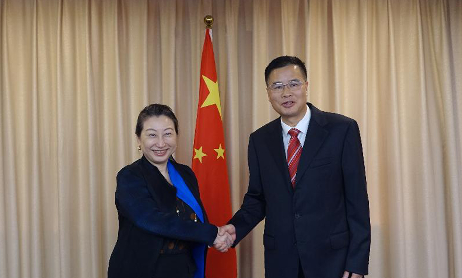 The Secretary for Justice, Ms Teresa Cheng, SC (left), meets with the Director-General of the Department of Justice of Guangdong Province, Mr Zeng Xianglu (right), in Guangzhou today (July 25).
