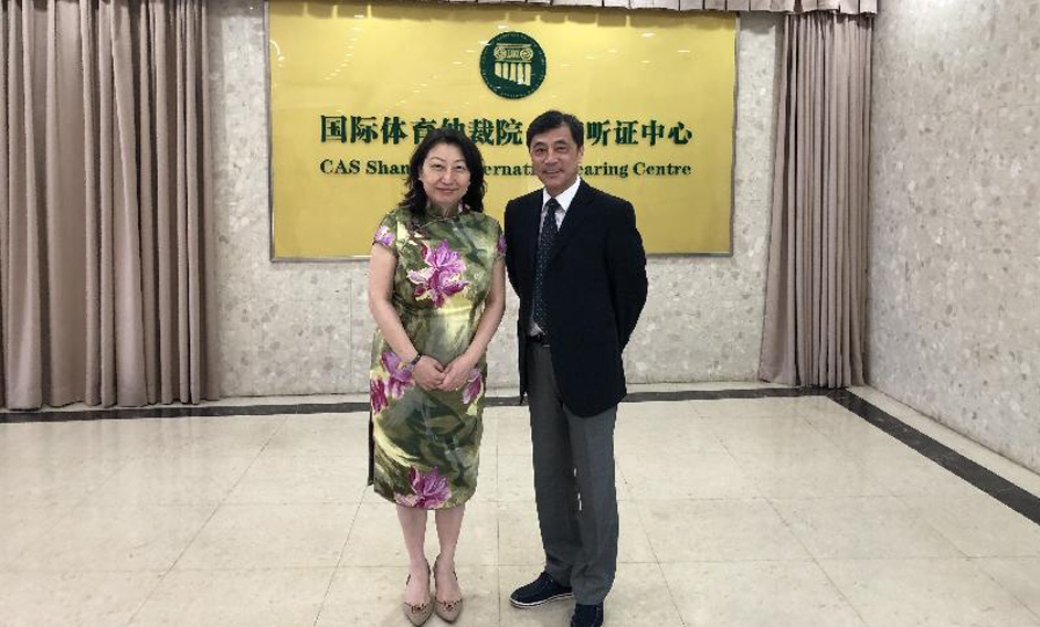 The Secretary for Justice, Ms Teresa Cheng, SC (left), together with Hong Kong legal and dispute resolution practitioners, visit the Court of Arbitration for Sport Shanghai Alternative Hearing Centre, meeting with the Commissioner of the centre, Mr Chen Yiping (right), today (August 19).
