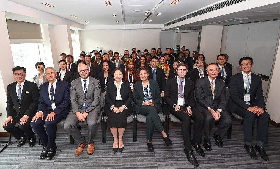 The Secretary for Justice, Ms Teresa Cheng, SC (front row, fourth left), is pictured with trainers and participants at the opening ceremony of the Investment Law and Investor-State Mediator Training Course today (October 28).