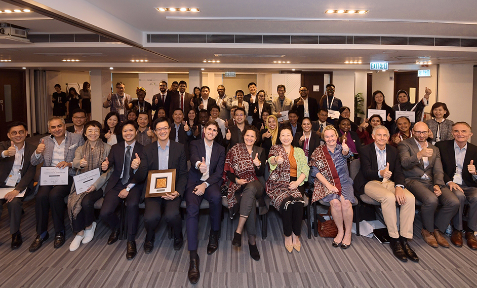 The Secretary for Justice, Ms Teresa Cheng, SC (front row, fifth right), is pictured with trainers and participants at the closing ceremony of the Investment Law and Investor-State Mediator Training Course on November 3.