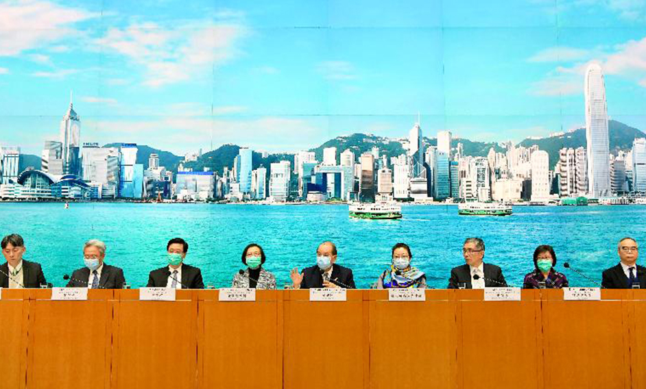 The Chief Secretary for Administration, Mr Matthew Cheung Kin-chung (centre), holds a press conference on measures to fight disease with the Secretary for Justice, Ms Teresa Cheng, SC (fourth right); the Secretary for Home Affairs, Mr Lau Kong-wah (first right); the Secretary for Financial Services and the Treasury, Mr James Lau (third right); the Secretary for the Civil Service, Mr Joshua Law (second left); the Secretary for Security, Mr John Lee (third left); the Secretary for Food and Health, Professor Sophia Chan (fourth left); the Director of Health, Dr Constance Chan (second right); and the Deputy Secretary for Food and Health (Food), Mr Daniel Cheng (first left), at the Central Government Offices, Tamar, today (February 7).