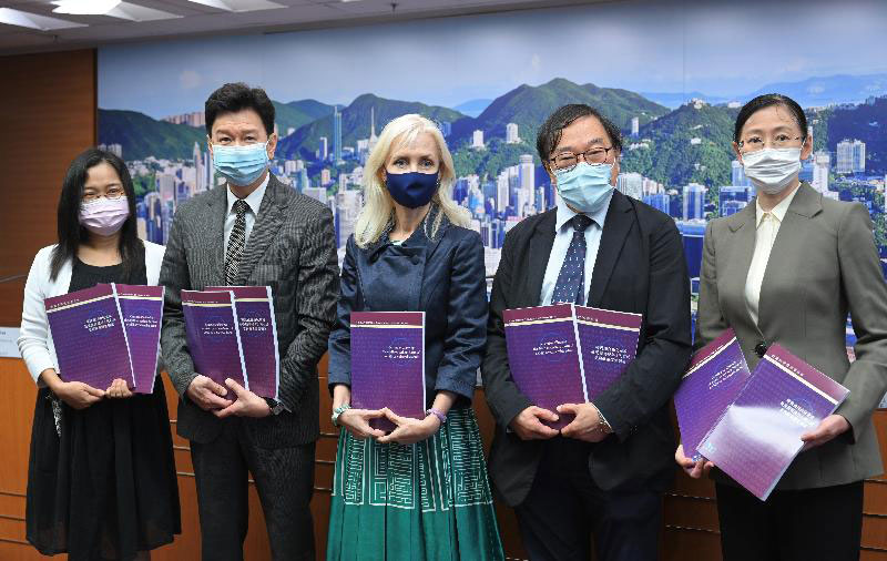 The Chairman of the Causing or Allowing the Death of a Child or Vulnerable Adult Sub-committee of the Law Reform Commission (LRC), Ms Amanda Whitfort (centre); members of the Sub-committee Dr Philip Beh (second right) and Mr Stephen Hung (second left); the Secretary of the LRC, Ms Adeline Wan (first left); and the Secretary to the Sub-committee, Ms Louisa Ng (first right), are pictured attending a press conference today (September 10) to release the report on causing or allowing the death or serious harm of a child or vulnerable adult. 