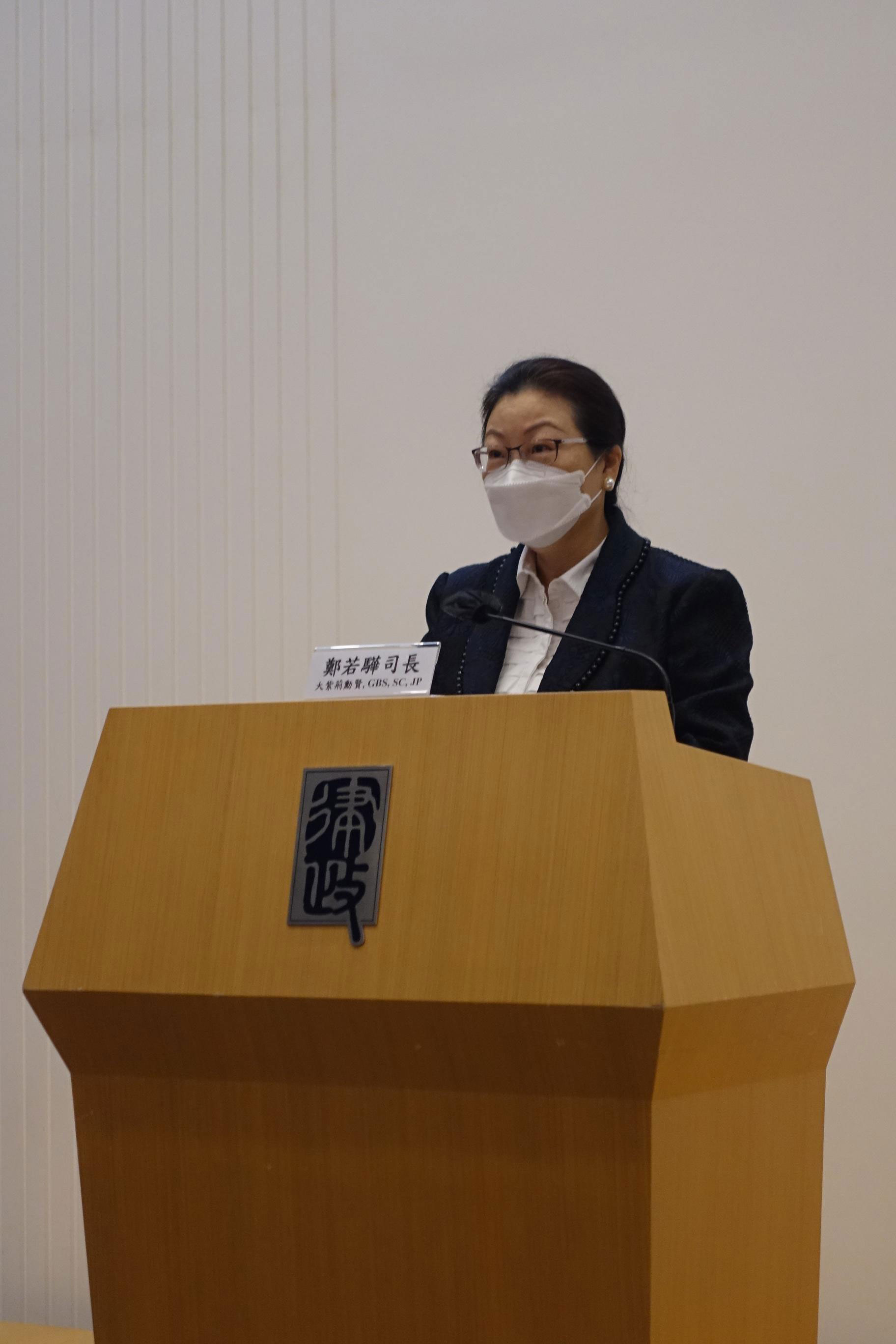 The Secretary for Justice, Ms Teresa Cheng, SC, delivers her opening remarks at the 2nd Guangdong-Hong Kong-Macao Greater Bay Area Judicial Case Seminar today (April 23).
