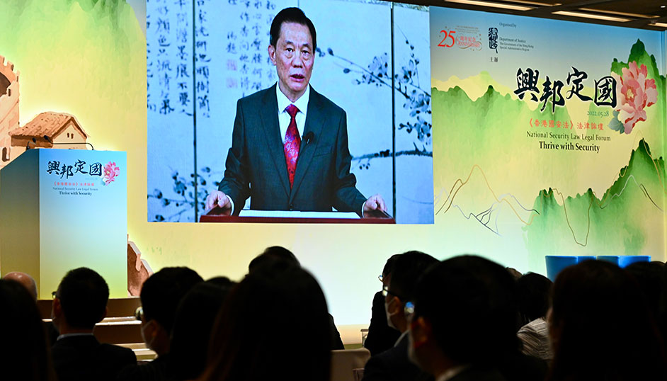The National Security Law Legal Forum under the theme "Thrive with Security" organised by the Department of Justice was held today (May 28). Photo shows former Deputy Director of the Hong Kong and Macao Affairs Office of the State Council Mr Deng Zhonghua giving a keynote speech at the forum.