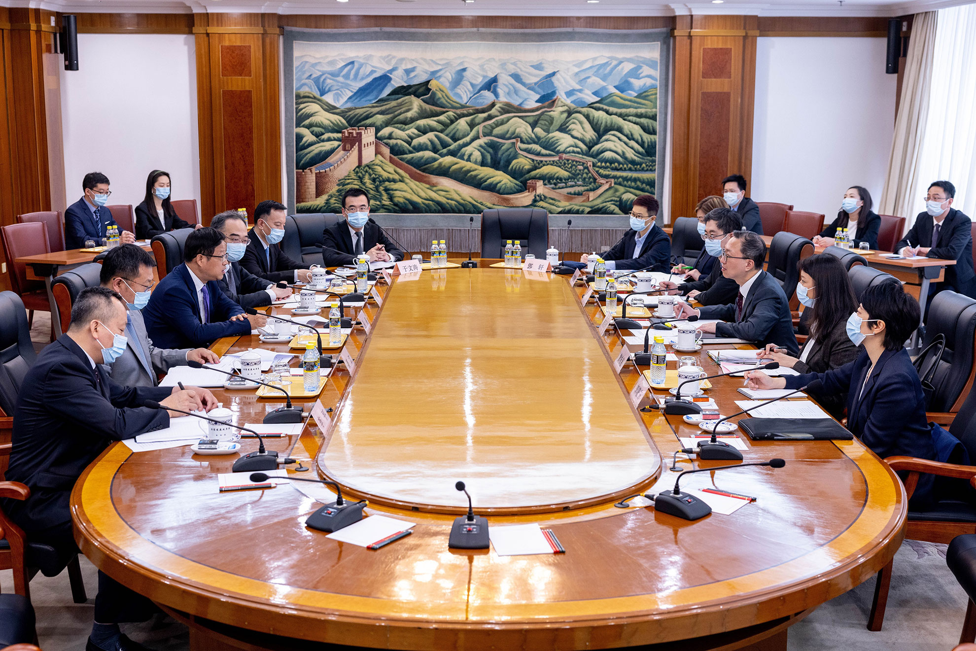 The Secretary for Justice, Mr Paul Lam, SC (third right), meets with Deputy Director of the National Development and Reform Commission Mr Cong Liang (third left) this afternoon (May 30) in Beijing. Photo shows both sides in the meeting.