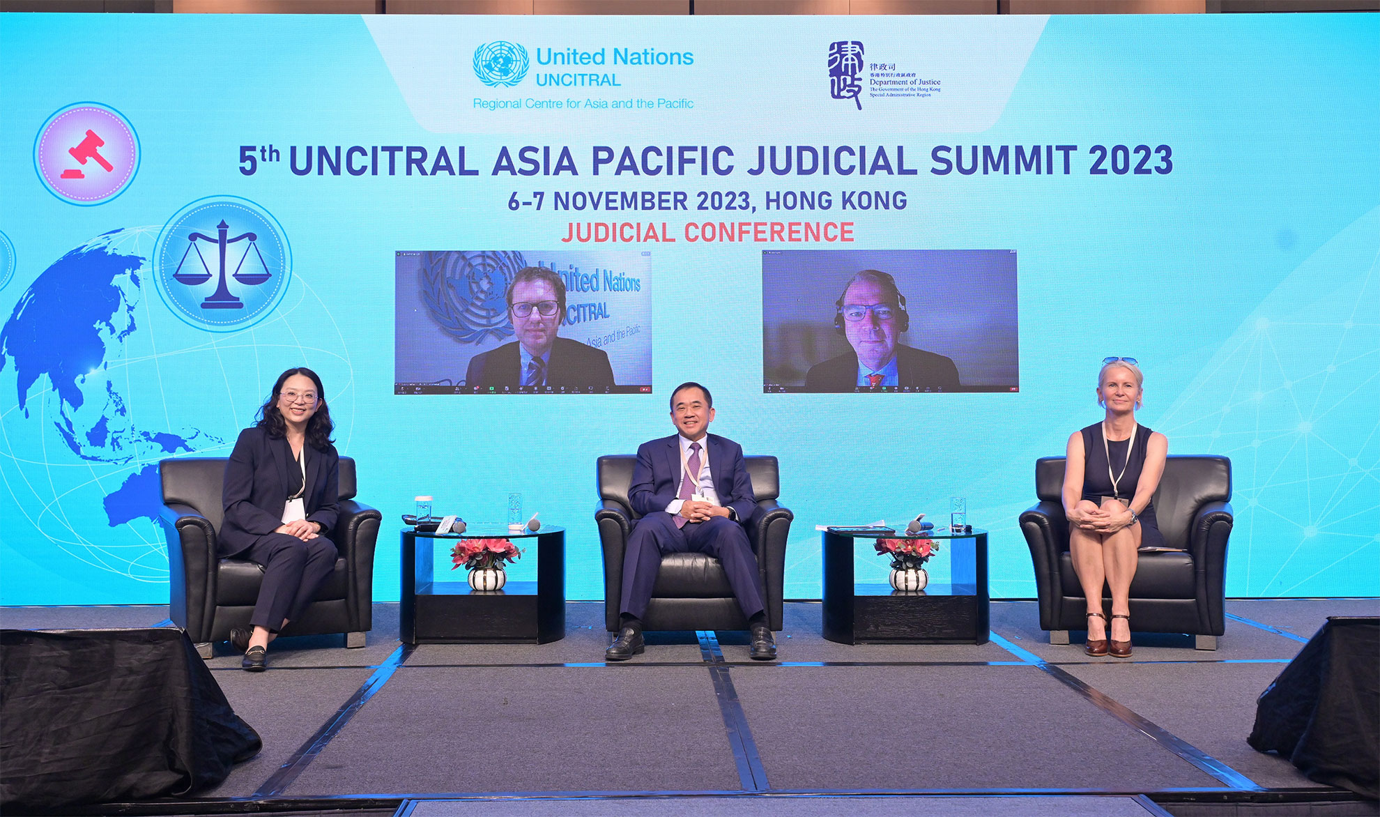 The five-day Hong Kong Legal Week 2023, an annual flagship event of the legal sector and the Department of Justice, themed "Onward & Forward: Connecting the World" began today (November 6). Photo shows (from left) the Head of the United Nations Commission on International Trade Law (UNCITRAL) Regional Centre for Asia and the Pacific, Ms Athita Komindr; Legal Officer of UNCITRAL Mr Alexander William Kunzelmann (left on screen); the Permanent Secretary of the Ministry of Digital Economy and Society of Thailand, Professor Wisit Wisitsora-at; Academic of TC Beirne School of Law of the University of Queensland, Australia, Dr Alan Davidson (right on screen); and Assistant Professor of the Chinese University of Hong Kong Dr Eliza Mik at panel session 4 on UNCITRAL's Work on Digital Economy and Trade at the 5th UNCITRAL Asia Pacific Judicial Summit - Judicial Conference.