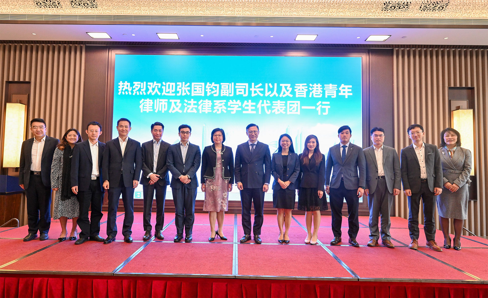 The Deputy Secretary for Justice, Mr Cheung Kwok-kwan, and a delegation of young lawyers led by him today (November 17) finished the first stop, Shenzhen, of their visit to Mainland cities of the Greater Bay Area. Photo shows Mr Cheung (seventh right), the Director of the Justice Bureau of Shenzhen Municipality, Ms Jiang Xiaowen (seventh left), and representatives of senior officials of the Bureau and two legal professional bodies after the meeting.