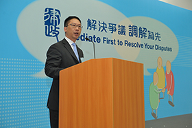 The Secretary for Justice, Mr Rimsky Yuen, SC delivers the Welcome Remarks at the “Mediate First” Pledge Reception on 18 July 2013.