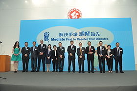 The Secretary for Justice, Mr Rimsky Yuen, SC and Ms Nancy Leung with representatives from companies supporting the “Mediate First” Pledge in 2013.1