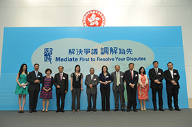 The Secretary for Justice, Mr Rimsky Yuen, SC and Ms Nancy Leung with representatives from companies supporting the “Mediate First” Pledge in 2013.2