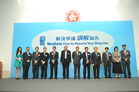 The Secretary for Justice, Mr Rimsky Yuen, SC and Ms Nancy Leung with representatives from companies supporting the “Mediate First” Pledge in 2013.3